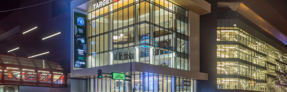 A wide angle shot traffic in front of the Target Center in Minneapolis, Minnesota, USA.