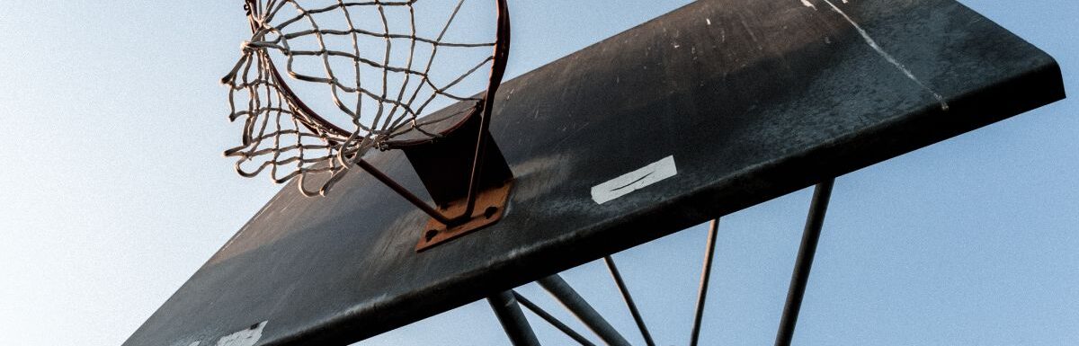 Worm's eye view photography of basketball hoop.