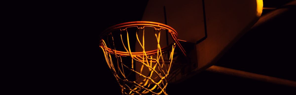 Basketball ring on a black background.