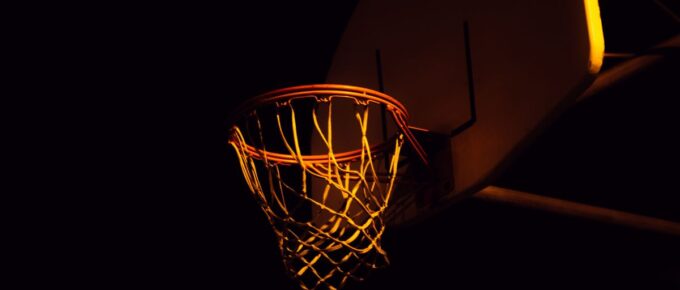 Basketball ring on a black background.