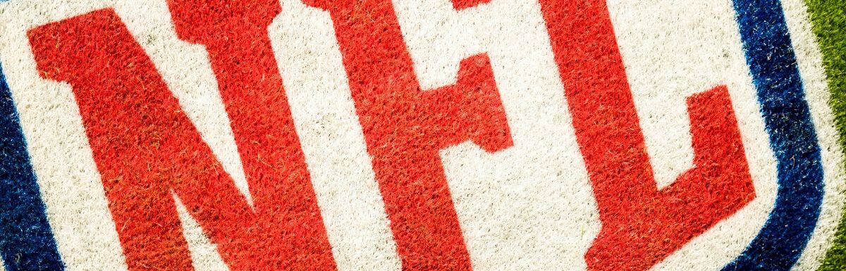 Aerial photo of NFL logo printed on a field.