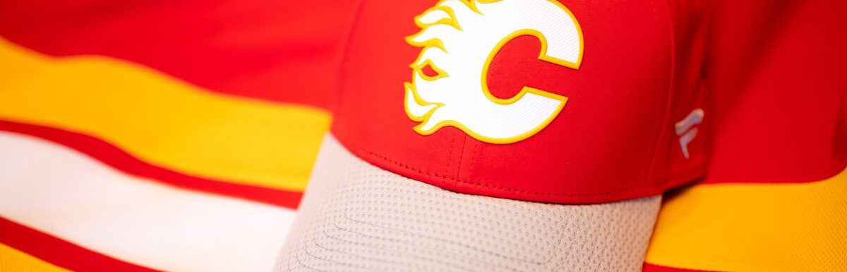 NHL hockey team, the Calgary Flames, official team jersey and hat.