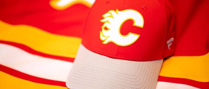 NHL hockey team, the Calgary Flames, official team jersey and hat.
