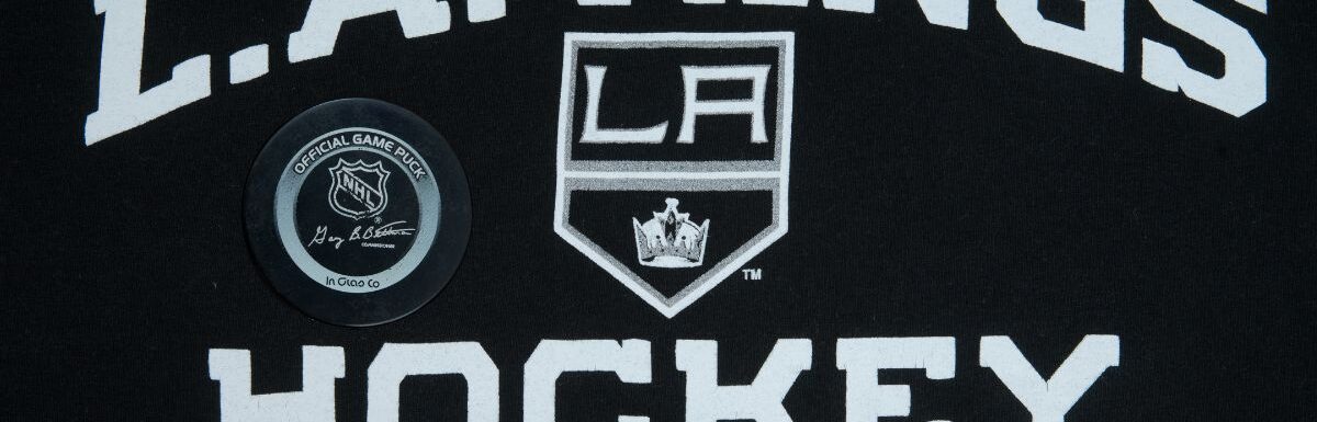Official NHL game puck with LA kings equipment.