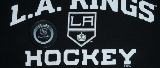 Official NHL game puck with LA kings equipment.