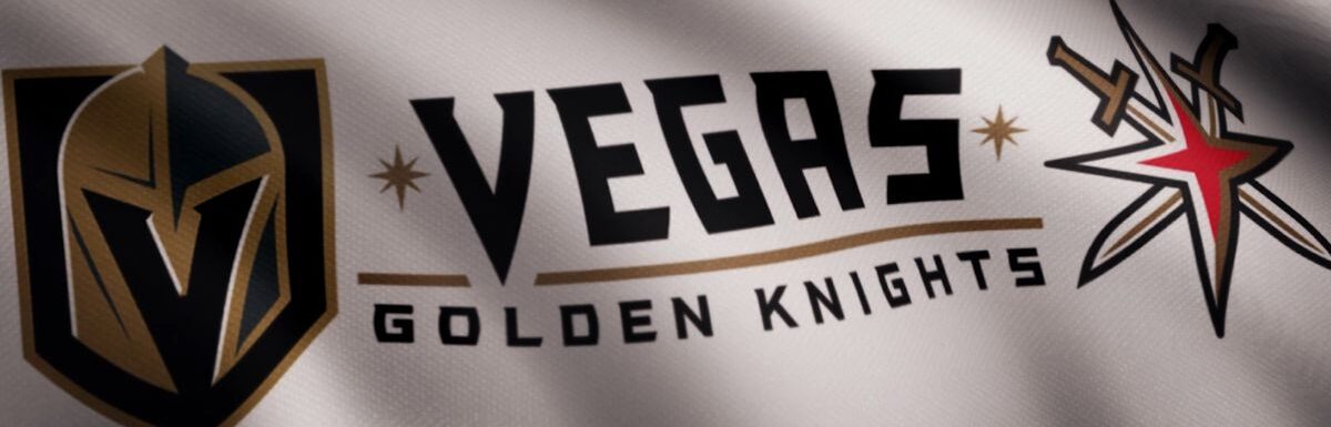 Close-up of waving flag with Vegas Golden Knights NHL hockey team logo, seamless loop.