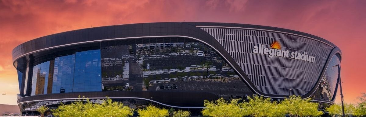 A gorgeous spring landscape at Allegiant Stadium surrounded by lush green trees and plants and powerful clouds at sunset in Las Vegas, Nevada, USA.