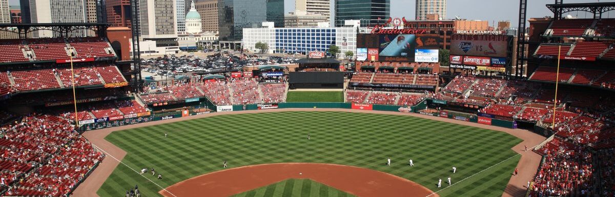 Busch Stadium with people inside during the day in St. Louis, Missouri, USA.