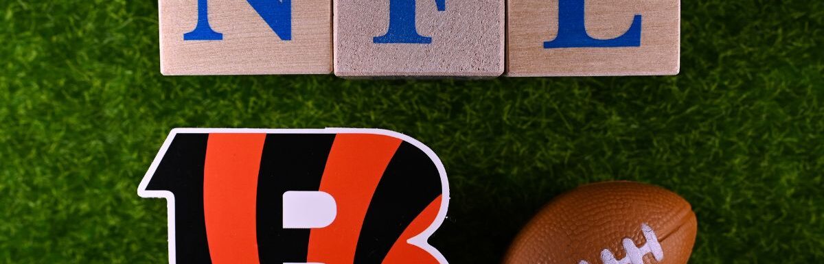 The emblem of the Cincinnati Bengals football club on the green lawn of the stadium.