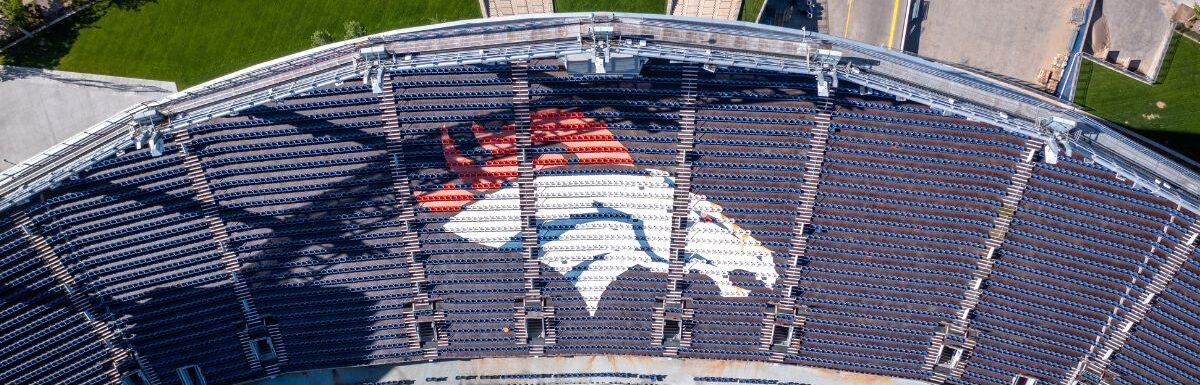 Aerial Top down of Denver Broncos logo in Stadium.
