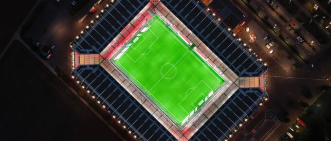 Aerial night view over illuminated Mewa Arena in Mainz, Rhineland-Palatinate, Germany.